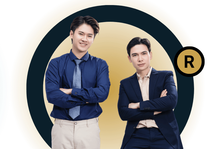 Two men in business attire posing.